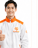 Smiling KindGo professional in uniform giving a thumbs up