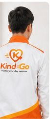 KindGo technician seen from behind in branded uniform