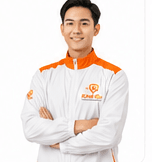 Smiling KindGo technician with arms crossed
